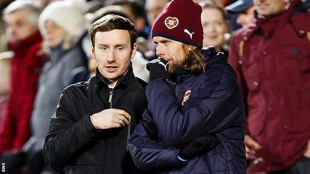 Austin McPhee (right) talks to Hearts head coach Ian Cathro during their 4-0 win over Kilmarnock