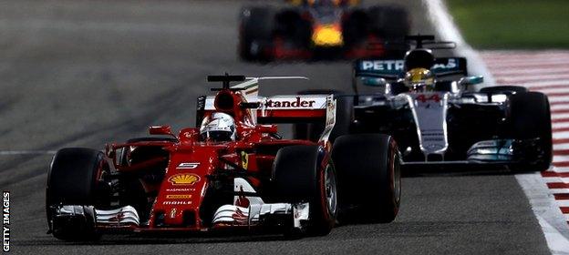 Sebastian Vettel leads Lewis Hamilton