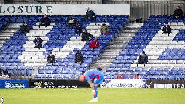 Supporters watch Inverness CT v Raith Rovers