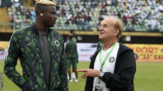 Victor Osimhen (left) with Nigeria coach Gernot Rohr