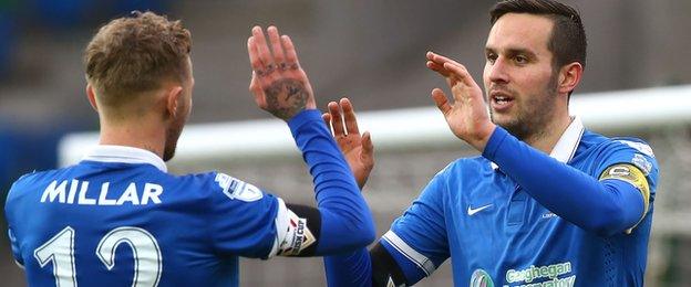 Blues skipper Andrew Waterworth celebrates his third goal against Armagh