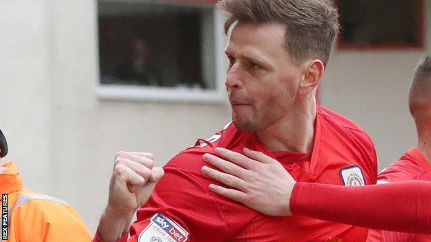 Chris Porter celebrates