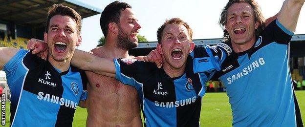 Wycombe celebrate avoiding relegation in 2013-14