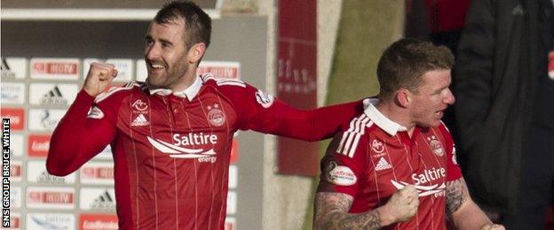 Niall McGinn and Jonny Hayes celebrate with Aberdeen