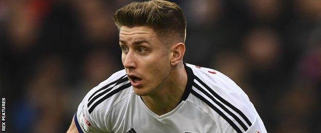 Tom Cairney in action for Fulham