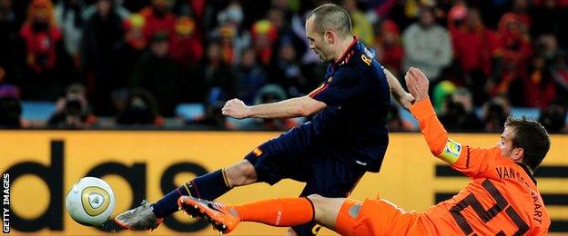 Barcelona's Andres Iniesta (left) scores Spain's winning goal in the 2010 World Cup final against Netherlands