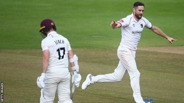 Chris Woakes takes the wicket of Jack Leach