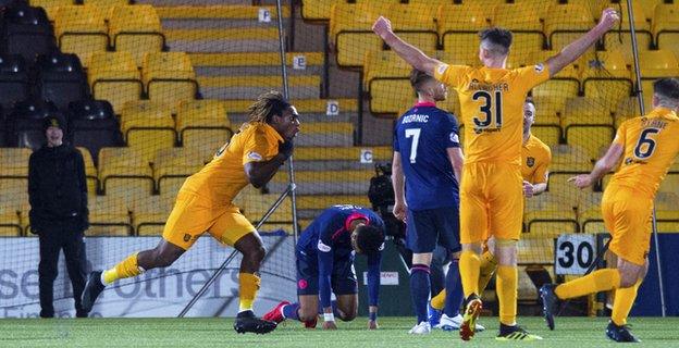 Livingston's Dolly Menga celebrates scoring against Hearts