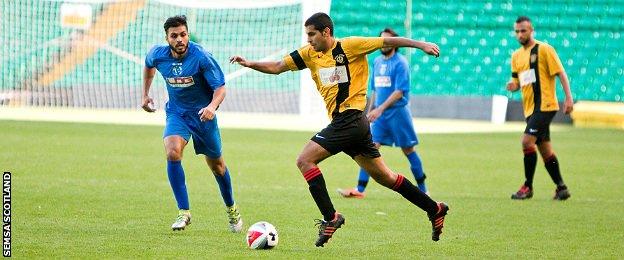 More action from the UK Asian Football Championship final at Celtic Park