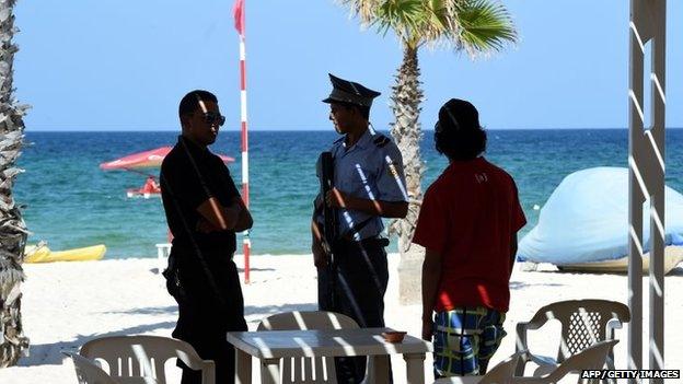 A Tunisian policeman stands guard on July 10, 2015 in the Mouradi Hotel in the touristic Port el Kantaoui, on the outskirts of Sousse