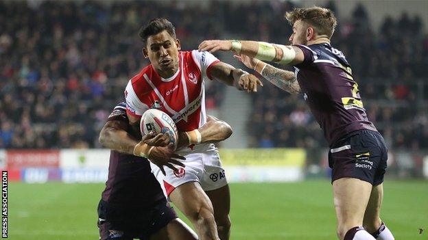 Kallum Watkins (left) and Richie Myler (right) halt Saints' main danger man Ben Barba