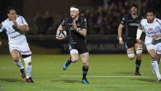 Finn Russell on the attack for Glasgow Warriors