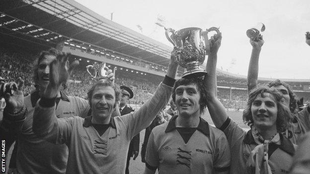 Mike Bailey (left of centre)