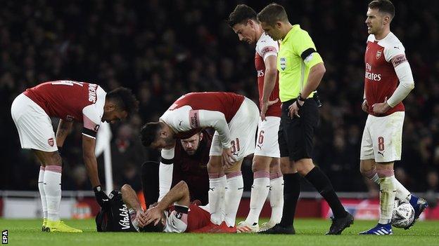 Sokratis Papastathopoulos was injured during Friday's FA Cup defeat by Manchester United