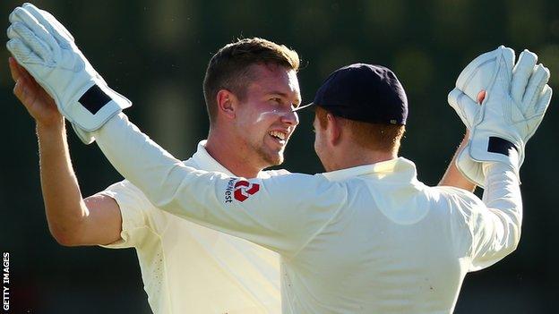 Jake Ball celebrates a wicket in a pre-Ashes warm-up game