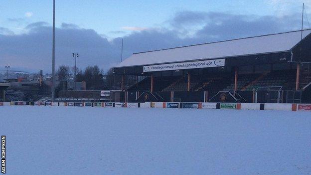 The pitch at Carrick Rangers covered by a blanket of snow