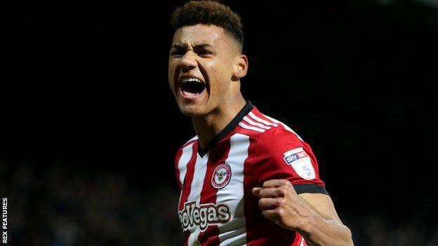 Ollie Watkins celebrates scoring for Exeter City