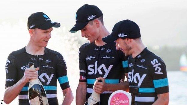 Chris Froome and Peter Kennaugh celebrate victory on stage one of the Vuelta a Espana