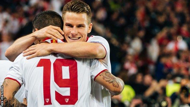 Kevin Gameiro celebrates scoring for Sevilla