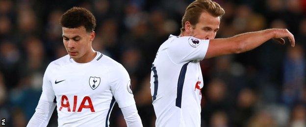 Dele Alli and Harry Kane react to Tottenham's defeat at Leicester