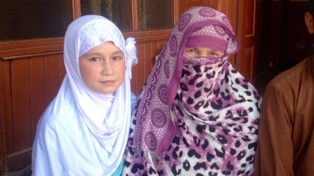 Insa Khan with her son and granddaughter