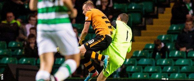 Alloa's Greig Spence is fouled by Celtic's Craig Gordon