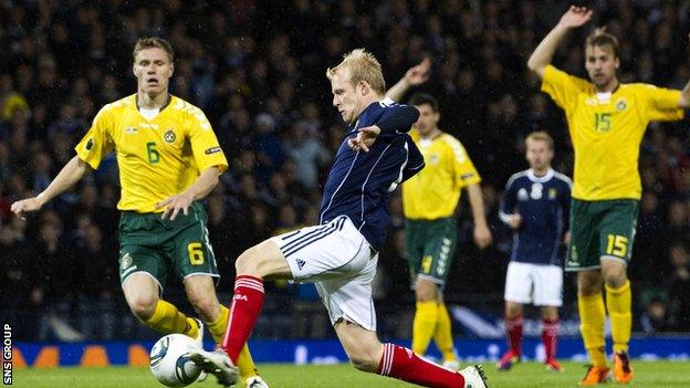 Steven Naismith scores the winner against Lithuania at Hampden in September 2011