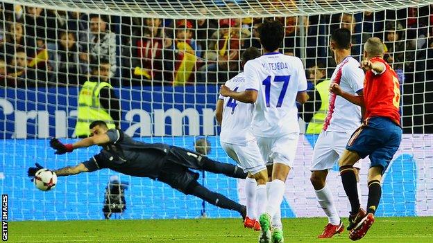 Iniesta added Spain's fifth with a solo run and finish from 25 yards