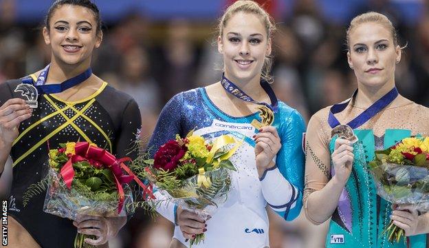 Ellie Downie (left) celebrates winning silver