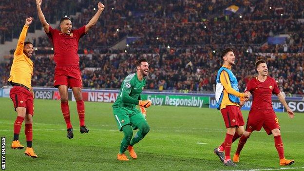 The Roma players celebrate after knocking Barcelona out of the Champions League on away goals