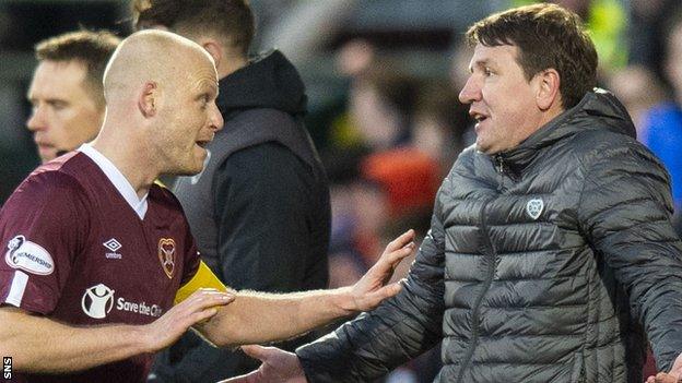 Hearts captain Steven Naismith has said he will take a 50% pay cut and manager Daniel Stendel has waived his salary