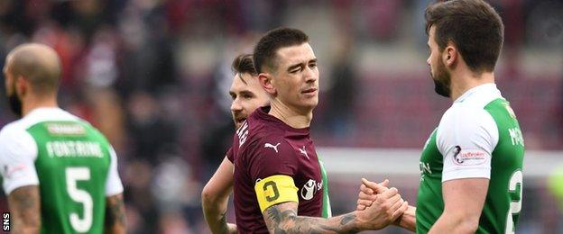 Hearts' Jamie Walker and Hibs' Darren McGregor shake hands at the final whistle