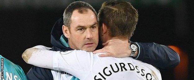 Paul Clement hugs Gylfi Sigurdsson