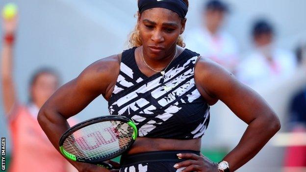 Serena Williams with her hands on her hips