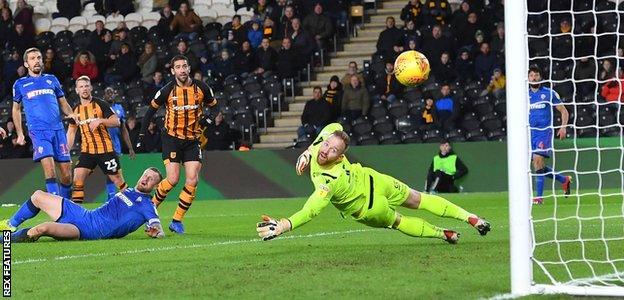 Hull City's Evandro scores their second goal against Bolton