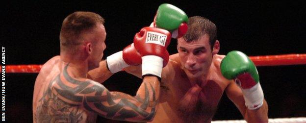 Joe Calzaghe outpointed Mikkel Kessler to claim the WBA and WBC belts