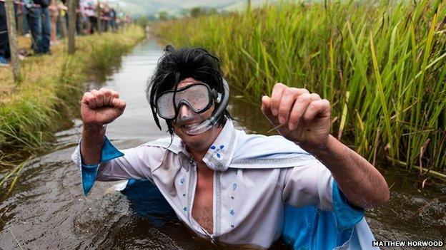 A competitor takes part in the World Bog Snorkelling Championships