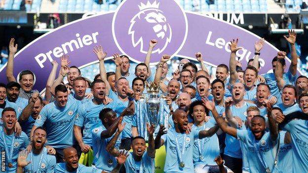 Manchester City celebrate winning the league