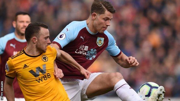 Burnley's James Tarkowski in action against Wolves