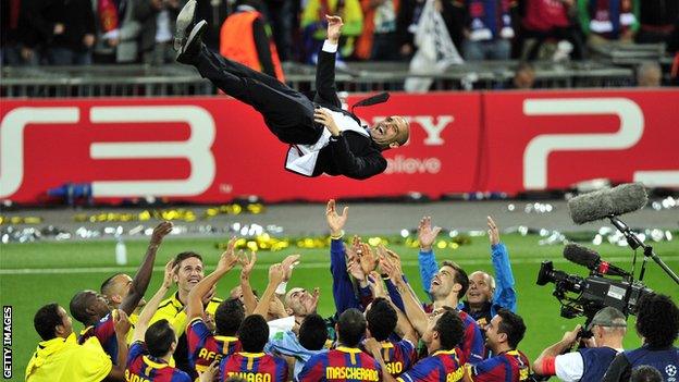 Pep Guardiola celebrates with his players when in charge of Barcelona