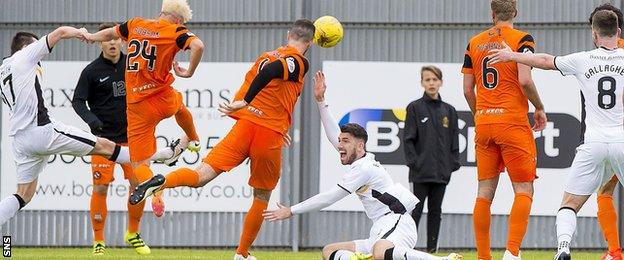 Dumbarton were awarded a penalty for an alleged push in the box