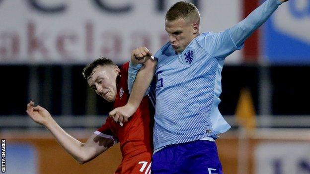 Luke Jephcott playing for Wales Under-19s