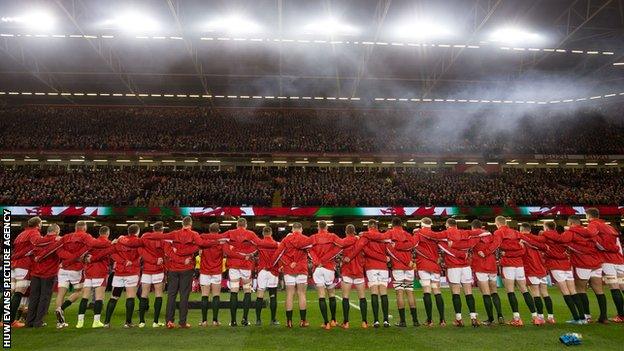 Wales rugby players line up at a full Principality Stadium against France in February 2020