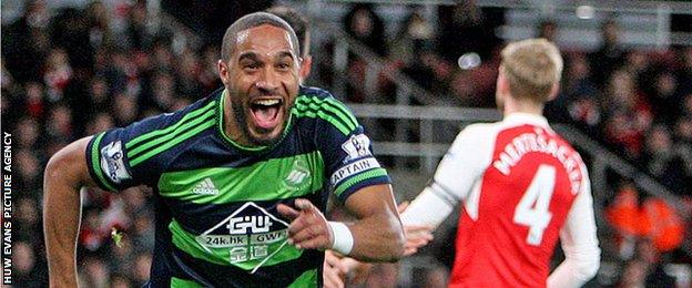 Ashley Williams celebrates scoring for Swansea against Arsenal