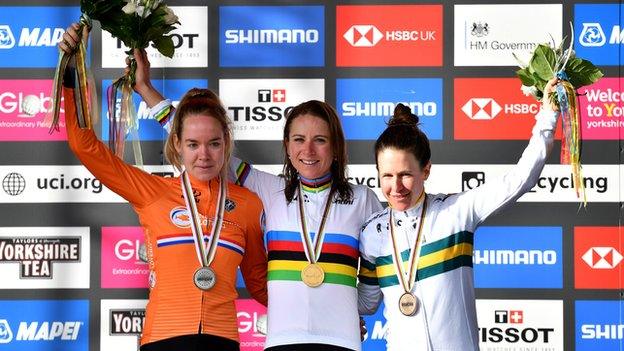 Netherlands' Annemiek van Vleuten celebrates on the podium after winning the 2019 Road World Championships title