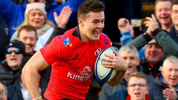 A delighted Jacob Stockdale runs in for an Ulster try against Racing 92 at Kingspan Stadium