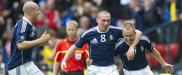 Alan Hutton, Scott Brown and Kenny Miller