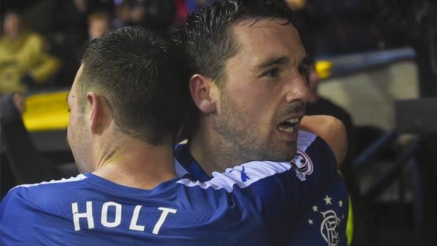 Rangers' Nicky Clark (right) celebrates