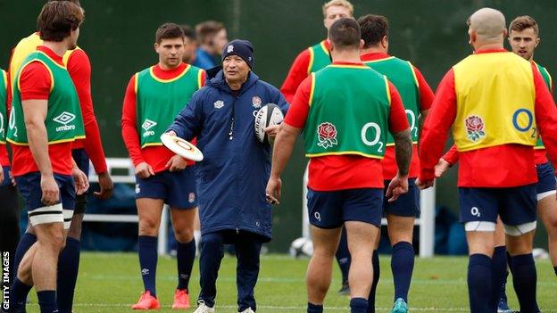 Eddie Jones and several England players in training