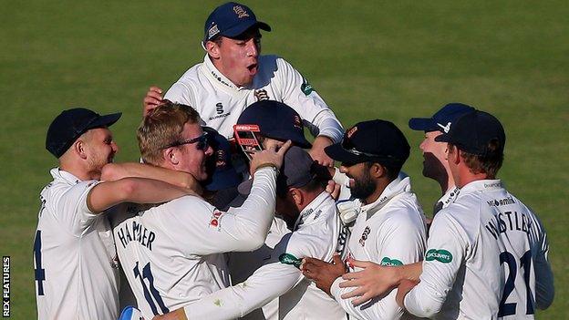 Essex celebrate after Simon Harmer takes the match-winning wicket